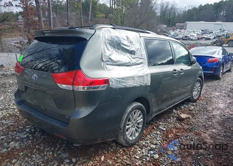 2011 Toyota Sienna Xle V6 z USA, uszkodzony, nr VIN 5TDYK3DC8BS128232